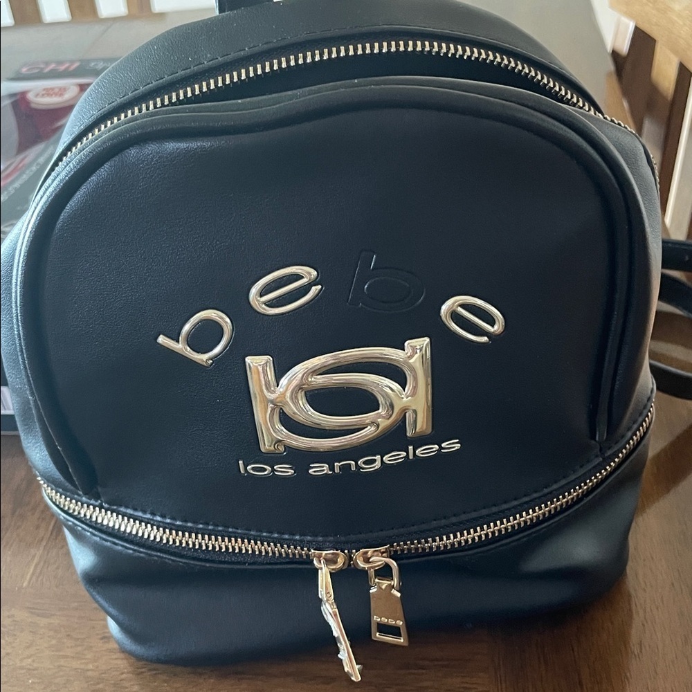 Bebe Black Backpack with Gold Details